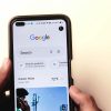 pexels photo 16629436 16629436 A close-up of a hand holding a smartphone with Google search displayed on the screen.