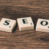 pexels photo 270637 270637 Scrabble tiles spelling 'SEO' on a wooden surface. Ideal for digital marketing themes.